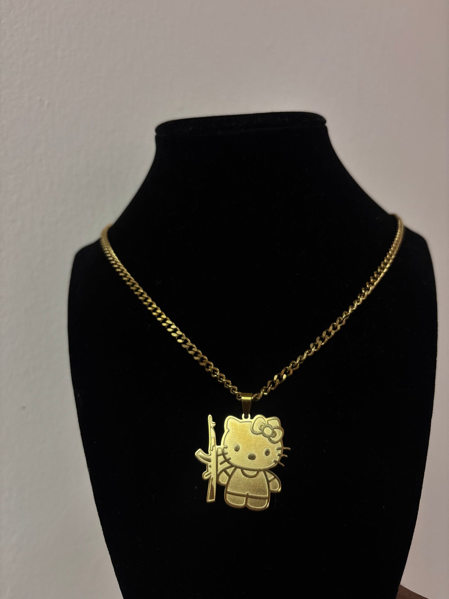 18k gold plated hello kitty gun necklace